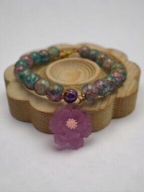 Handmade wirewrapped Elegant Multicolor Beaded Bracelet with Floral Charm
